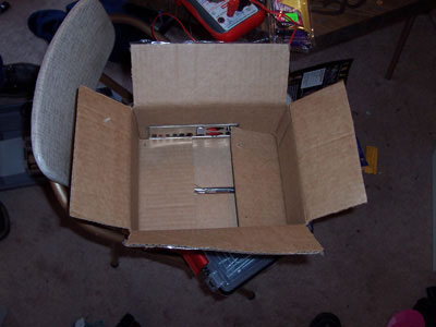 The temporary enclosure that was designed -- a cardboard box :)